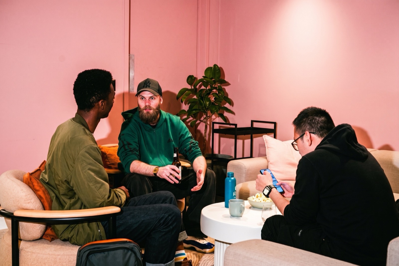 Members socialising at a late-night event in the Juntos Bedford Row communal space