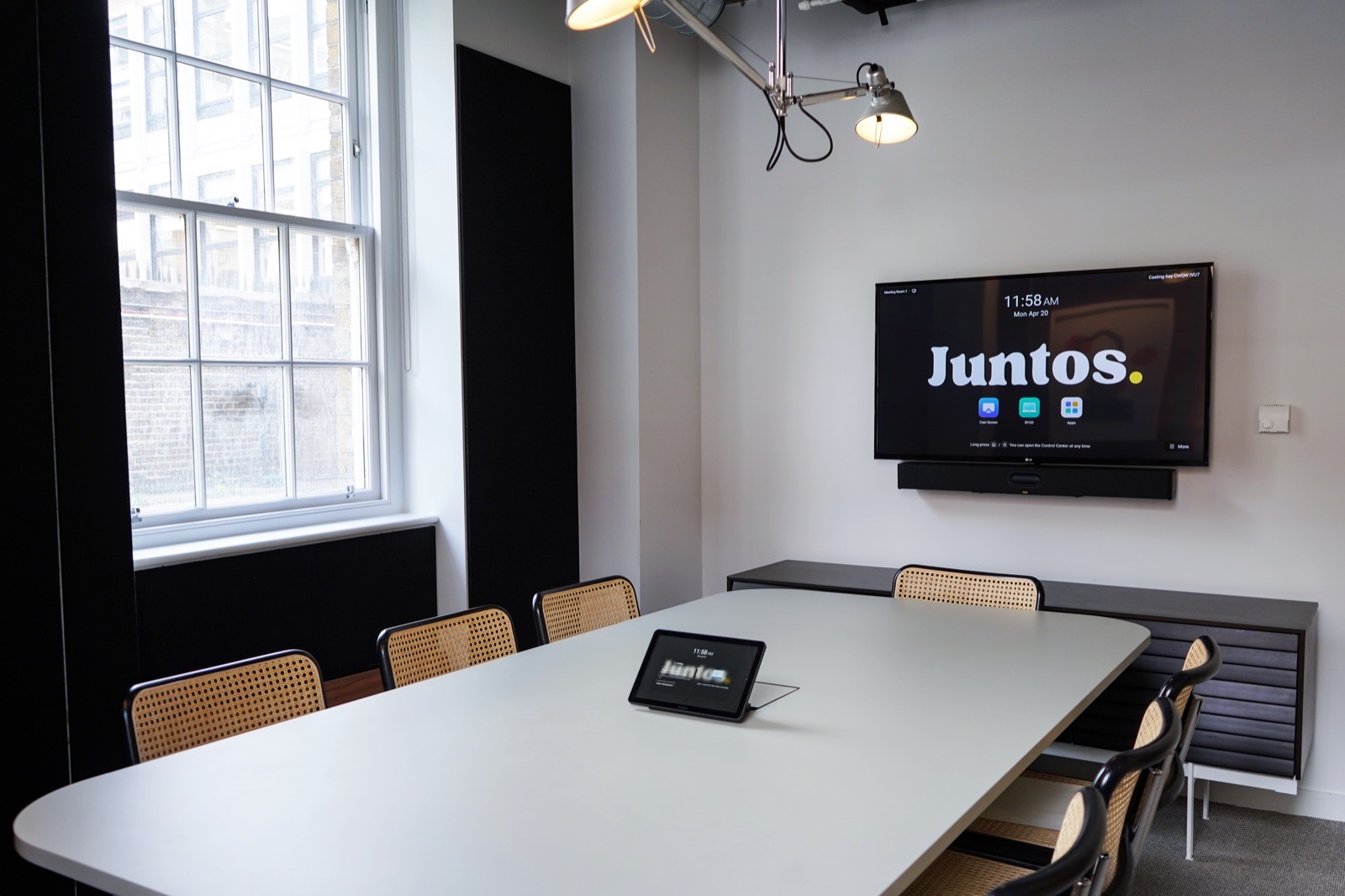 Ten-seat Meeting Room Two at Juntos Holborn with a long table and natural daylight